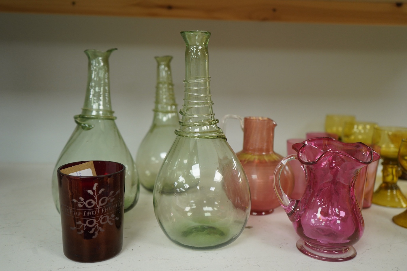 A collection of assorted coloured glassware, 18th century and later. Tallest 24cm. Condition - fair